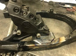 Harley FXR rear brake tab with brake caliper